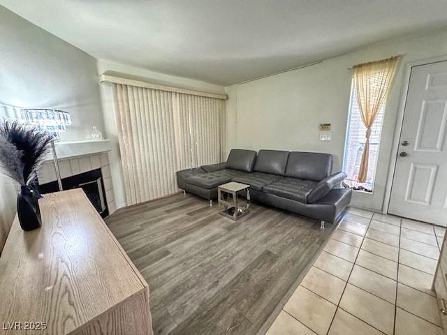 3101 Casey Dr Unit 204, Las Vegas, NV 89120 - tiled living room featuring a tile fireplace