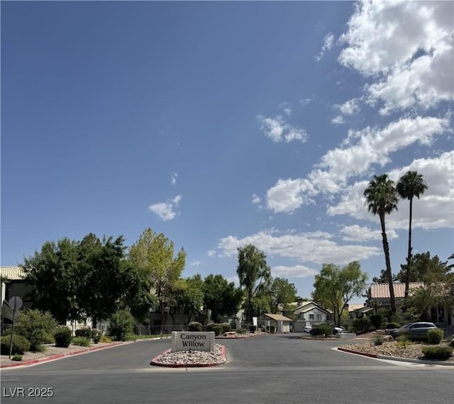 3101 Casey Dr Unit 204, Las Vegas, NV 89120 - view of asphalt road featuring curbs, a residential view, and traffic signs