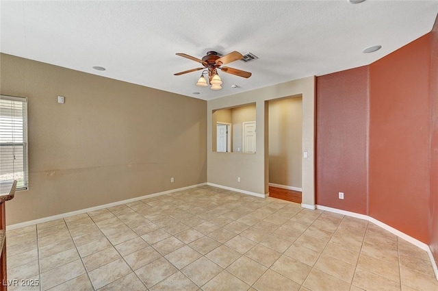 3609 Blue Pimpernel Ave, North Las Vegas, NV 89081 - unfurnished room featuring ceiling fan and light tile patterned floors