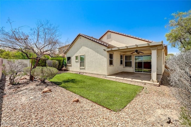 3609 Blue Pimpernel Ave, North Las Vegas, NV 89081 - rear view of house featuring a ceiling fan, stucco siding, and a patio