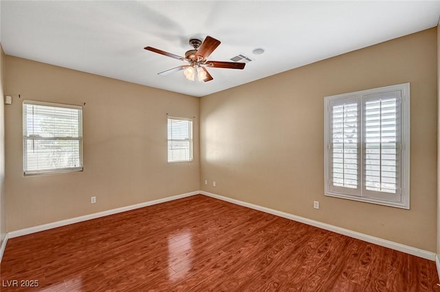 3609 Blue Pimpernel Ave, North Las Vegas, NV 89081 - unfurnished room featuring wood finished floors and a ceiling fan