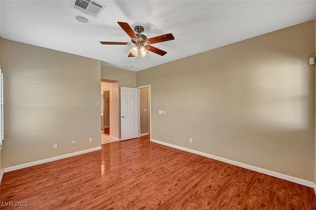 3609 Blue Pimpernel Ave, North Las Vegas, NV 89081 - unfurnished room with wood finished floors and a ceiling fan