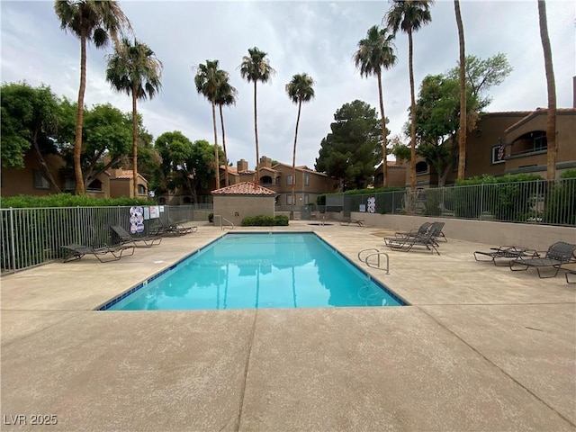220 Mission Catalina Ln Unit 203, Las Vegas, NV 89107 - community pool with a patio