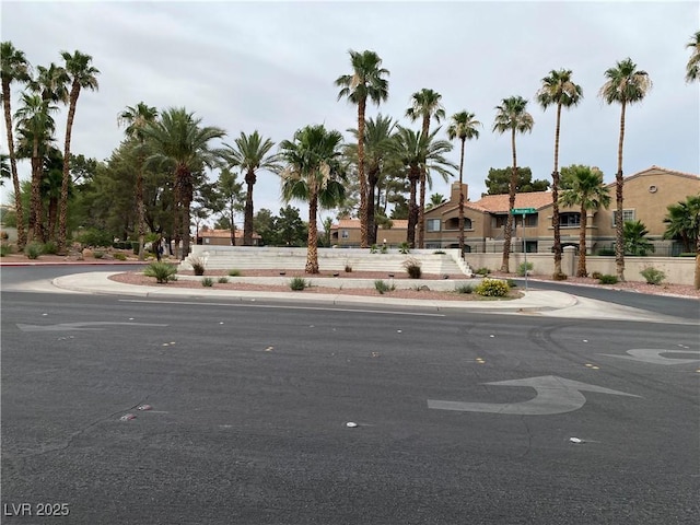 220 Mission Catalina Ln Unit 203, Las Vegas, NV 89107 - view of asphalt street with curbs and sidewalks