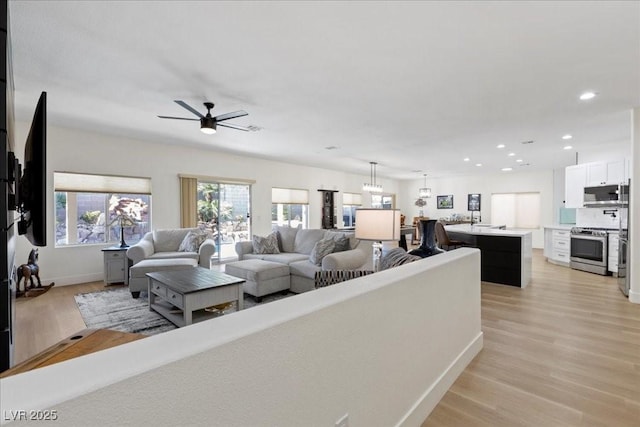 9612 Glengarry Dr, Las Vegas, NV 89129 - living area with light wood finished floors, recessed lighting, and a ceiling fan