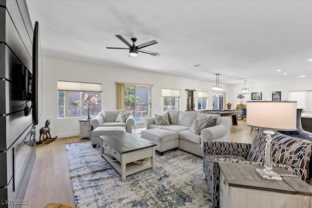 9612 Glengarry Dr, Las Vegas, NV 89129 - living area with light wood-style flooring, ceiling fan, and recessed lighting