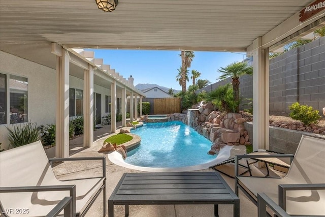 9612 Glengarry Dr, Las Vegas, NV 89129 - view of swimming pool featuring a patio, a fenced backyard, and a pool with connected hot tub