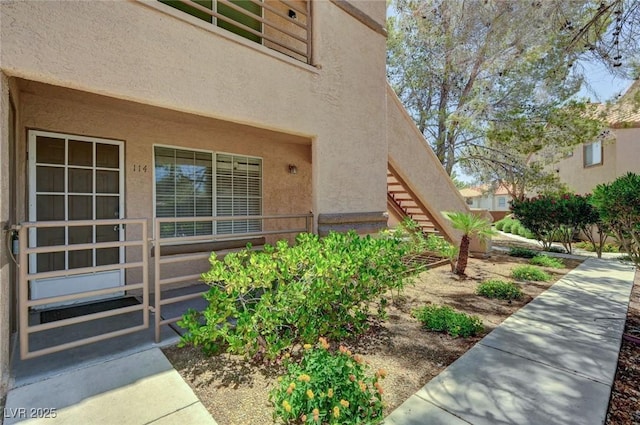 9070 Spring Mountain Rd Unit 114, Las Vegas, NV 89117 - view of exterior entry with stucco siding