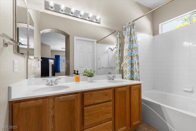 8563 Red Diamond St, Las Vegas, NV 89123 - full bath with shower / bath combo, double vanity, and tile patterned floors