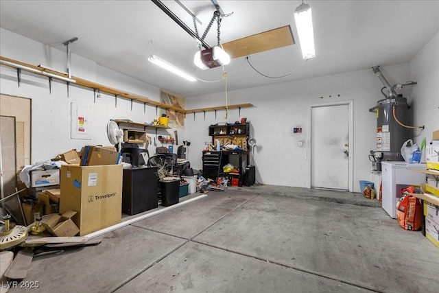 8563 Red Diamond St, Las Vegas, NV 89123 - garage with water heater, a garage door opener, and a workshop area