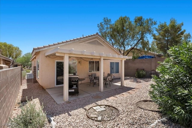 8563 Red Diamond St, Las Vegas, NV 89123 - rear view of property with stucco siding, a pergola, a fenced backyard, and a patio