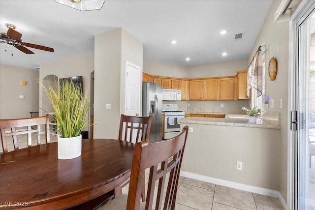 8563 Red Diamond St, Las Vegas, NV 89123 - dining room featuring a ceiling fan, light tile patterned flooring, and recessed lighting