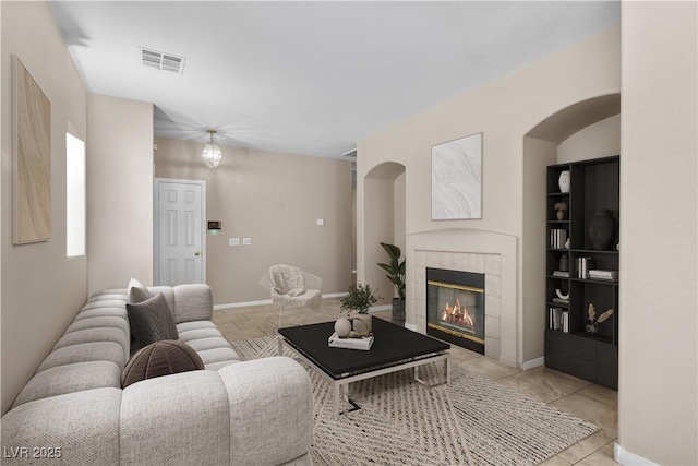 8563 Red Diamond St, Las Vegas, NV 89123 - living area featuring a fireplace and light tile patterned floors