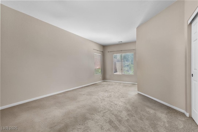 8563 Red Diamond St, Las Vegas, NV 89123 - empty room with carpet flooring and baseboards
