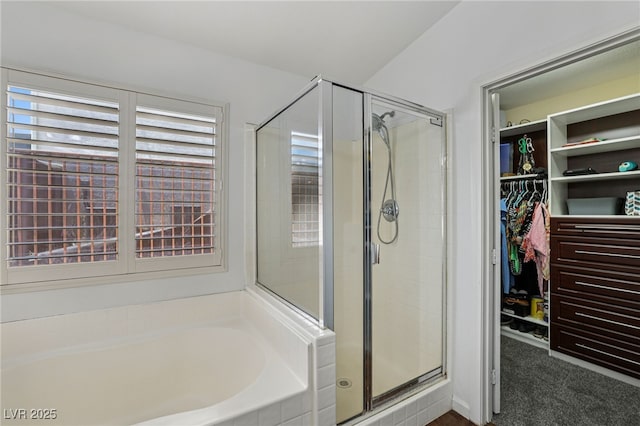 7927 Villa Salsa Ave, Las Vegas, NV 89131 - bathroom with a shower stall, a bath, and a spacious closet