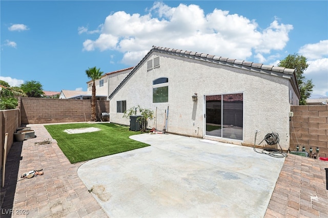 7927 Villa Salsa Ave, Las Vegas, NV 89131 - rear view of property with a fenced backyard, stucco siding, and a patio area