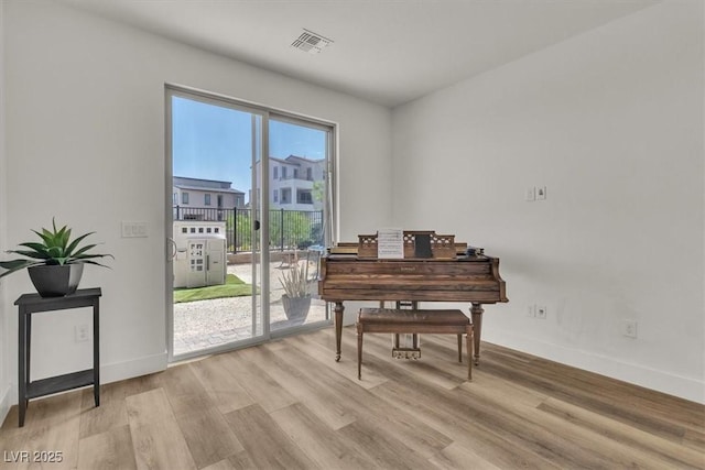 11695 Gentle Birdsong Ave, Las Vegas, NV 89138 - living area featuring wood finished floors and baseboards