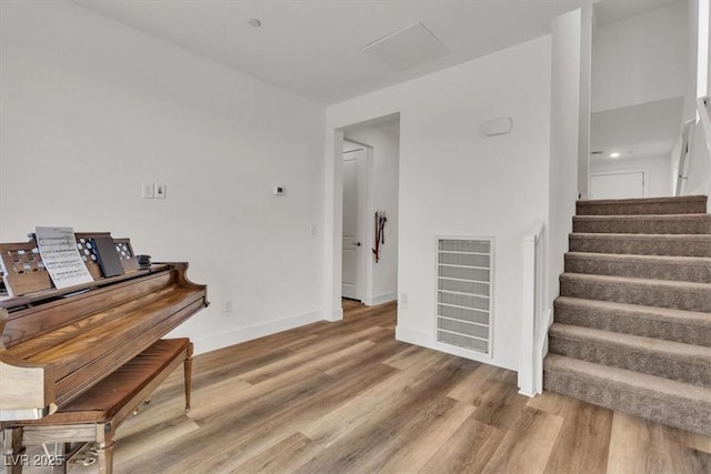 11695 Gentle Birdsong Ave, Las Vegas, NV 89138 - staircase featuring wood finished floors and baseboards