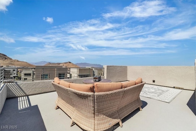 11695 Gentle Birdsong Ave, Las Vegas, NV 89138 - patio / terrace with a mountain view and outdoor lounge area