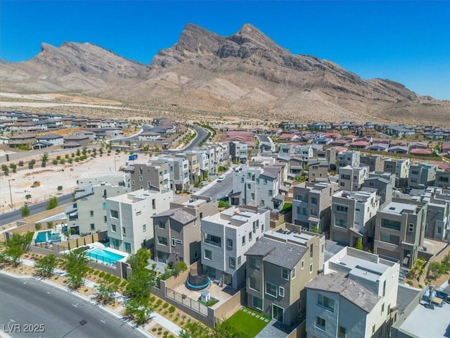 11695 Gentle Birdsong Ave, Las Vegas, NV 89138 - aerial overview of property's location with a mountainous background and nearby suburban area