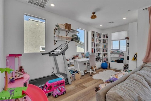 11695 Gentle Birdsong Ave, Las Vegas, NV 89138 - workout area with wood finished floors, healthy amount of natural light, and recessed lighting