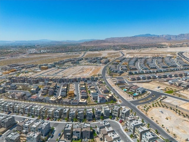 11695 Gentle Birdsong Ave, Las Vegas, NV 89138 - aerial overview of property's location featuring mountains and nearby suburban area