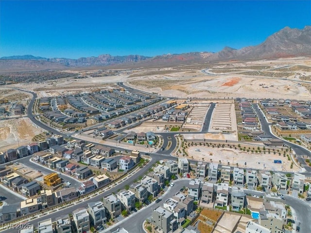 11695 Gentle Birdsong Ave, Las Vegas, NV 89138 - aerial view of property and surrounding area featuring a mountain backdrop and nearby suburban area