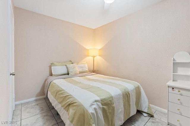 3715 Tabor Ave, North Las Vegas, NV 89030 - bedroom with ceiling fan and baseboards