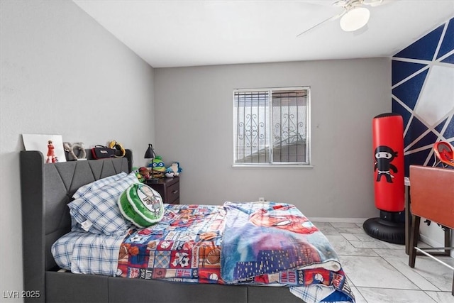 3715 Tabor Ave, North Las Vegas, NV 89030 - bedroom with marble look tiles and ceiling fan