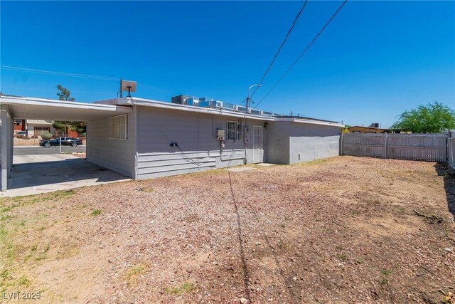1121 W Monroe Ave, Las Vegas, NV 89106 - back of house with a carport