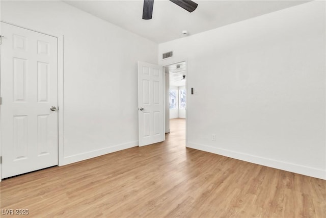 1121 W Monroe Ave, Las Vegas, NV 89106 - unfurnished bedroom featuring light wood-style floors and ceiling fan