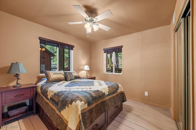 4581 Aspen Ave, Mount Charleston, NV 89124 - bedroom with light wood-style flooring and ceiling fan
