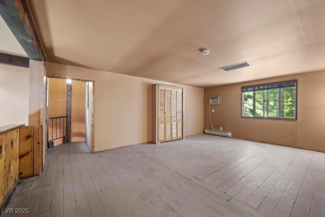 4581 Aspen Ave, Mount Charleston, NV 89124 - empty room featuring baseboard heating and wood-type flooring