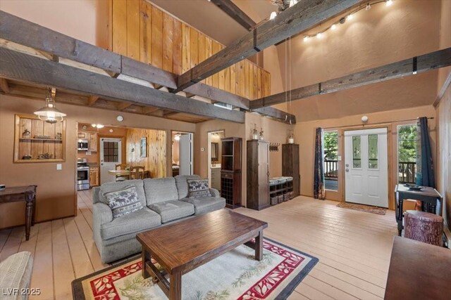 4581 Aspen Ave, Mount Charleston, NV 89124 - living area featuring a high ceiling, hardwood / wood-style floors, and beamed ceiling