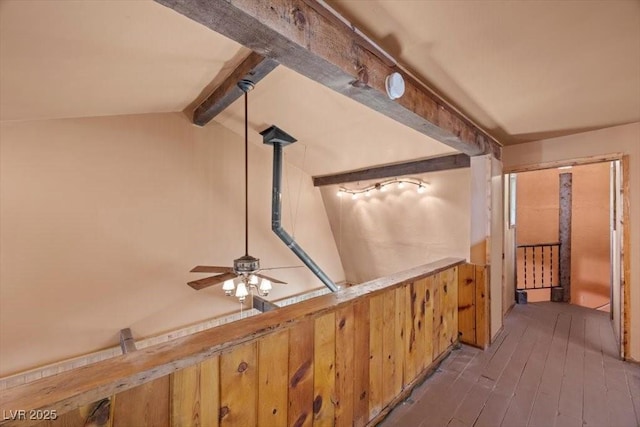 4581 Aspen Ave, Mount Charleston, NV 89124 - detailed view of beamed ceiling, ceiling fan, and wood finished floors