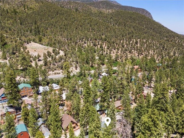 4581 Aspen Ave, Mount Charleston, NV 89124 - aerial view of property's location with mountains and a heavily wooded area
