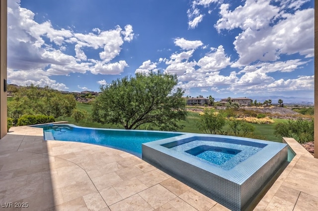 583 Saint Croix St, Henderson, NV 89012 - view of swimming pool with an in-ground hot tub, a patio, and an infinity pool