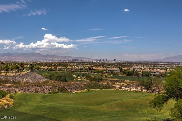 583 Saint Croix St, Henderson, NV 89012 - view of property's community with view of golf course, a mountain view, and a putting green