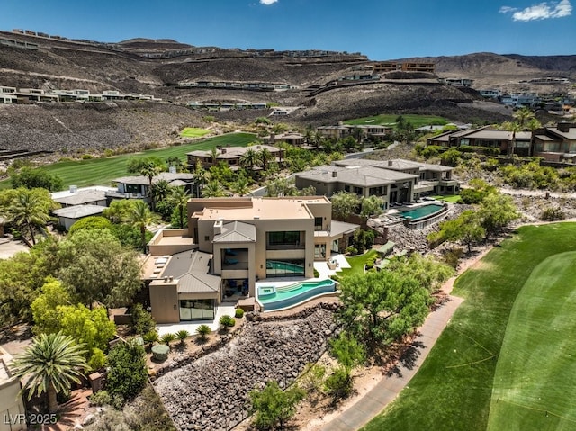 583 Saint Croix St, Henderson, NV 89012 - aerial view of residential area featuring a mountainous background and a golf course