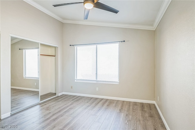 2229 Bowstring Dr, Las Vegas, NV 89142 - unfurnished bedroom featuring light wood-type flooring, a closet, crown molding, and ceiling fan