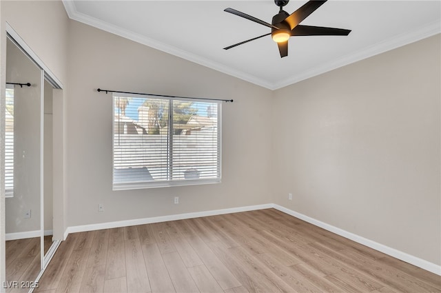 2229 Bowstring Dr, Las Vegas, NV 89142 - unfurnished room featuring light wood-style flooring, a ceiling fan, ornamental molding, and lofted ceiling