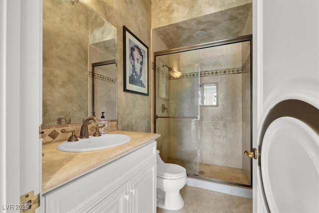 2200 Glenbrook Way, Las Vegas, NV 89117 - bathroom with vanity, a stall shower, and tile patterned floors