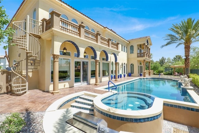 2200 Glenbrook Way, Las Vegas, NV 89117 - back of house featuring a balcony, stairway, stucco siding, and a patio area