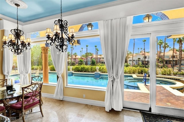2200 Glenbrook Way, Las Vegas, NV 89117 - dining area featuring crown molding, a chandelier, plenty of natural light, and tile patterned floors