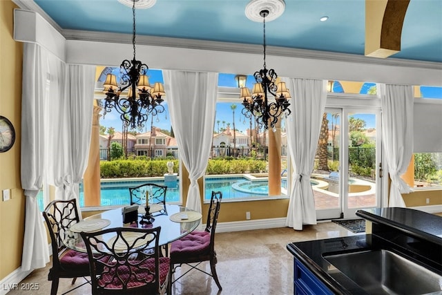 2200 Glenbrook Way, Las Vegas, NV 89117 - dining space featuring a chandelier and crown molding