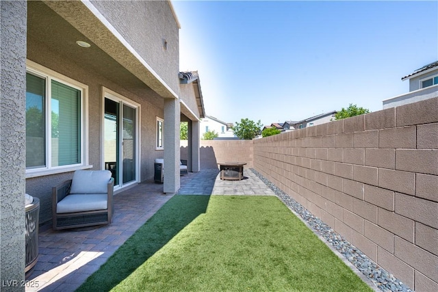 4376 Latitude Valley Ct, North Las Vegas, NV 89084 - fenced backyard with a patio
