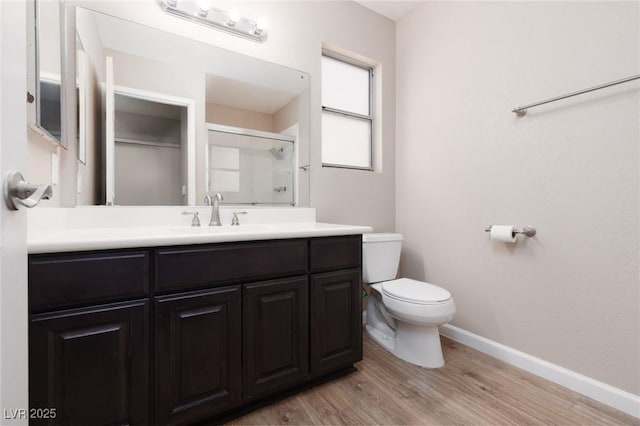 317 Brent Ct, Henderson, NV 89074 - full bathroom featuring a stall shower, wood finished floors, and vanity