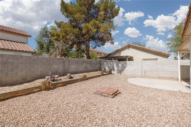 317 Brent Ct, Henderson, NV 89074 - fenced backyard with a patio area