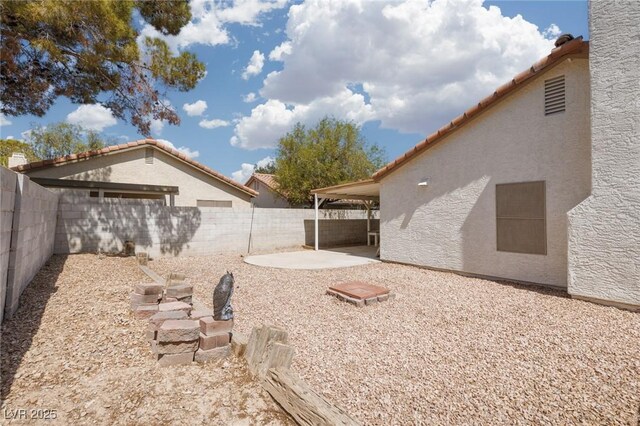 317 Brent Ct, Henderson, NV 89074 - fenced backyard with a patio area