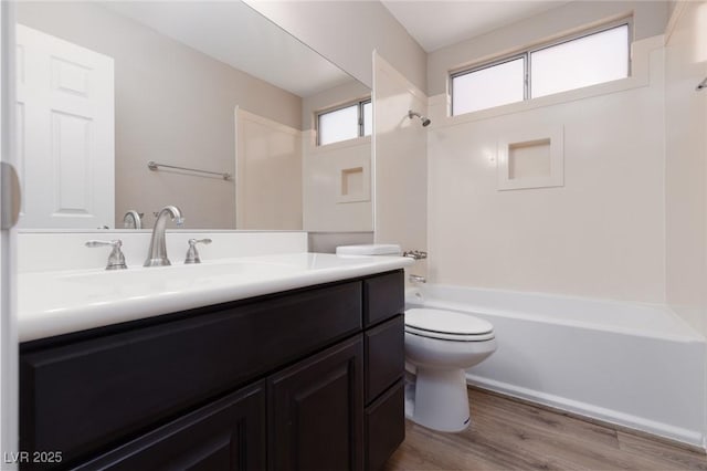 317 Brent Ct, Henderson, NV 89074 - full bath with vanity, washtub / shower combination, and wood finished floors